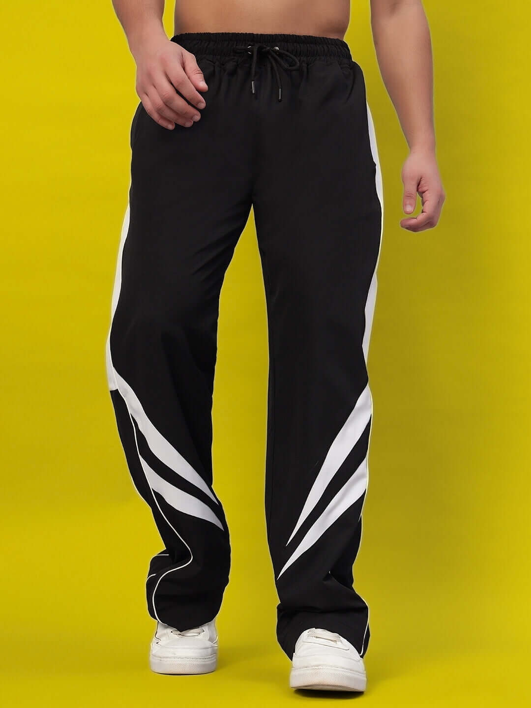 Alt Tag: Versatile black parachute cargo pants with custom fit option, featuring stylish white details, perfect for modern casual wear.