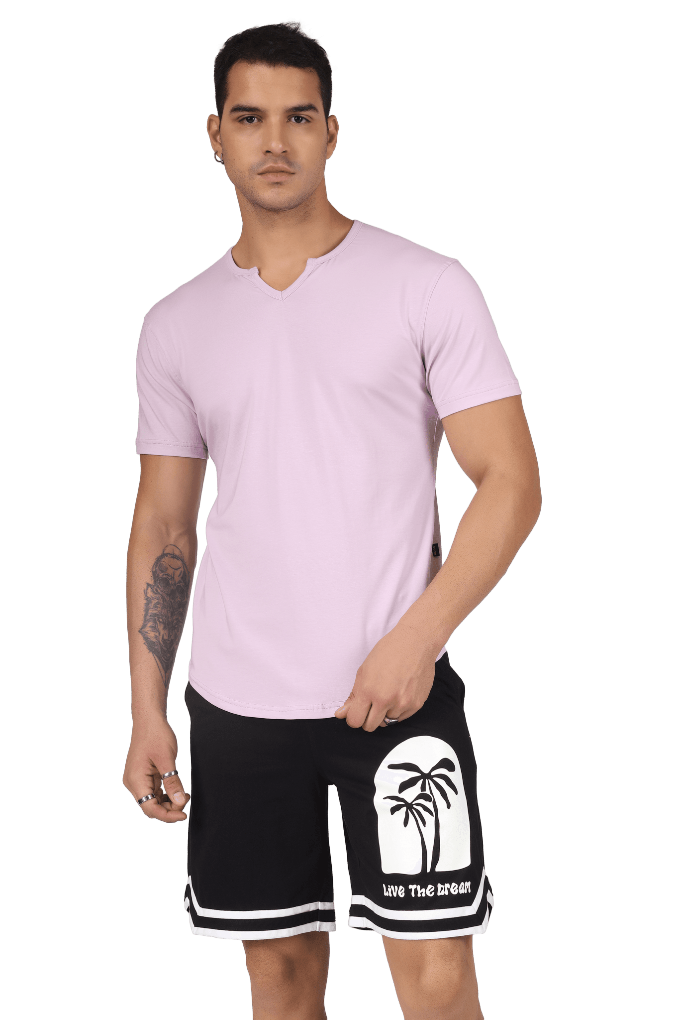 Man wearing a VIKING REGULAR FIT T-SHIRT LILAC with beach-themed shorts, showcasing a stylish and comfortable fit.