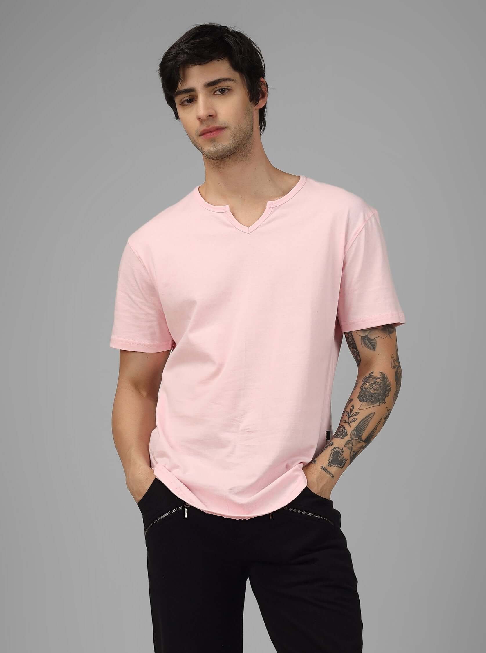 Model wearing Viking Regular Fit T-Shirt in baby pink, made from 100% cotton, highlighting its casual and comfortable style.