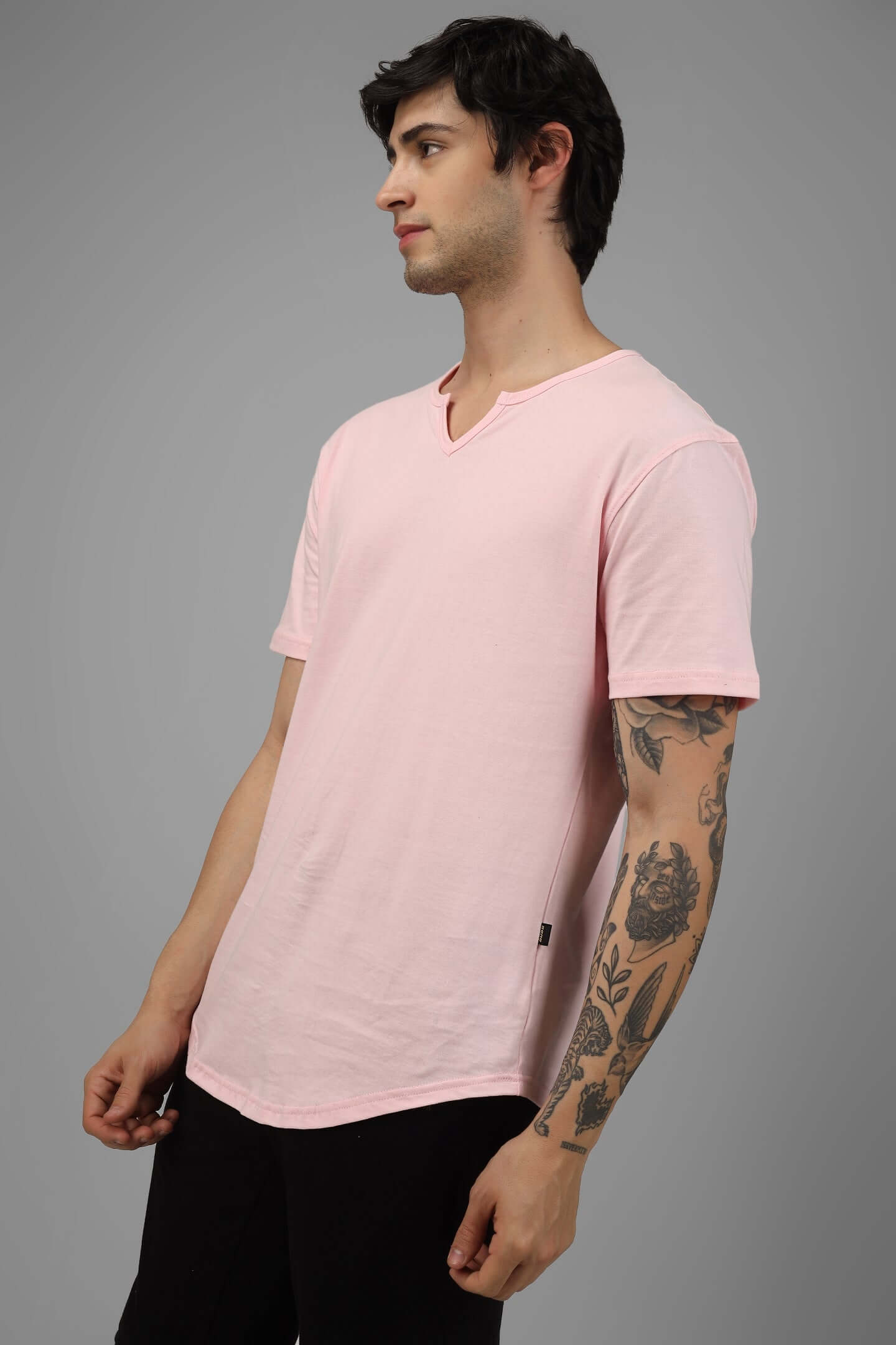 Man wearing Viking Regular Fit T-Shirt in Baby Pink, 100% cotton, bio-washed, 190 GSM, premium fabric, made in India.