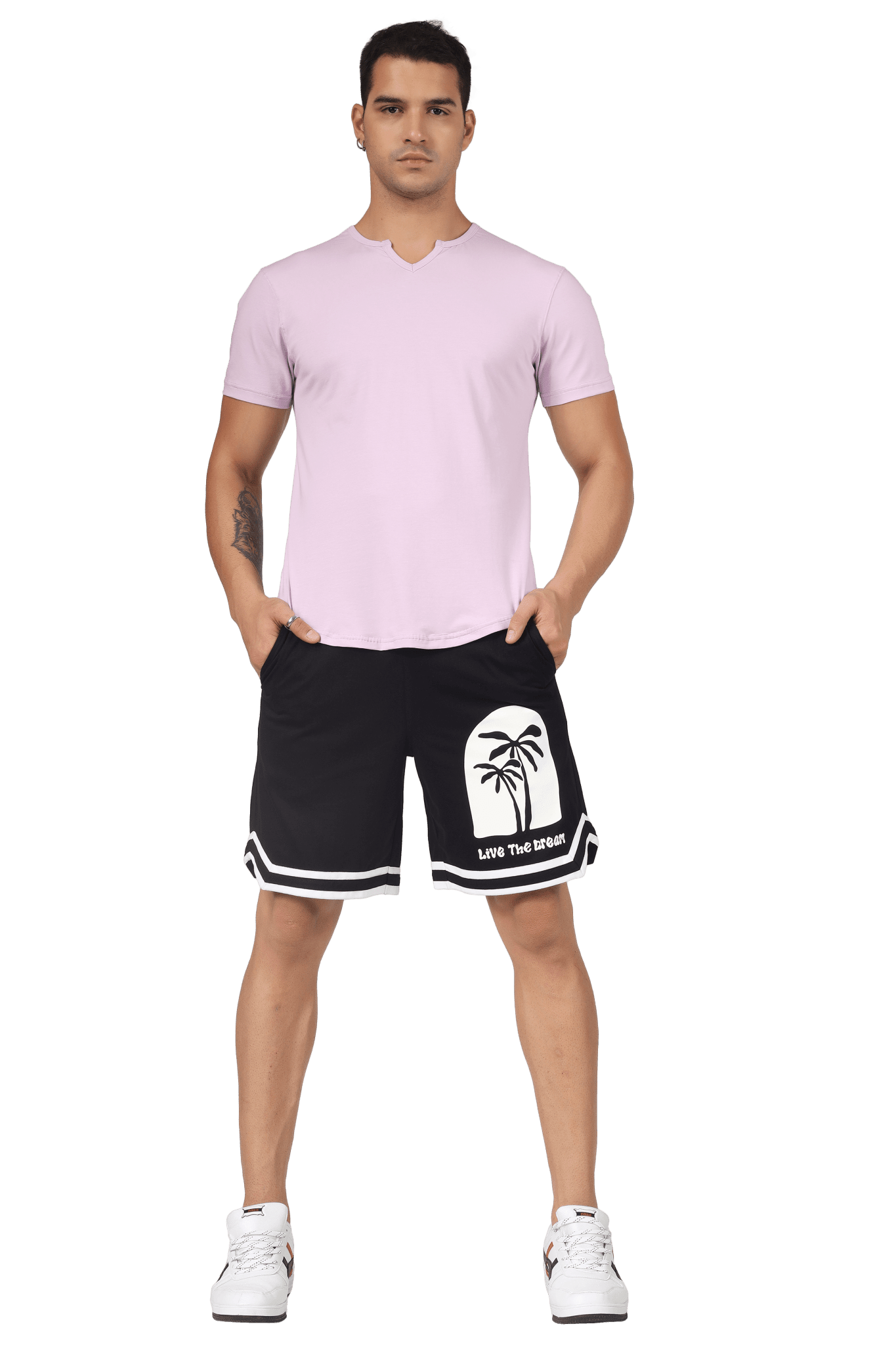 Man wearing VIKING REGULAR FIT T-SHIRT LILAC with black shorts and white sneakers