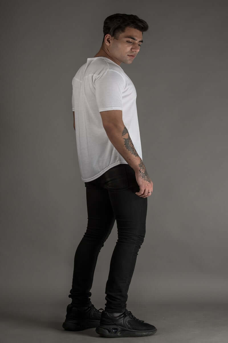 Side view of model wearing Viking Regular Fit White T-Shirt, 100% cotton, showcasing premium heavy gauge fabric, ideal for casual wear.