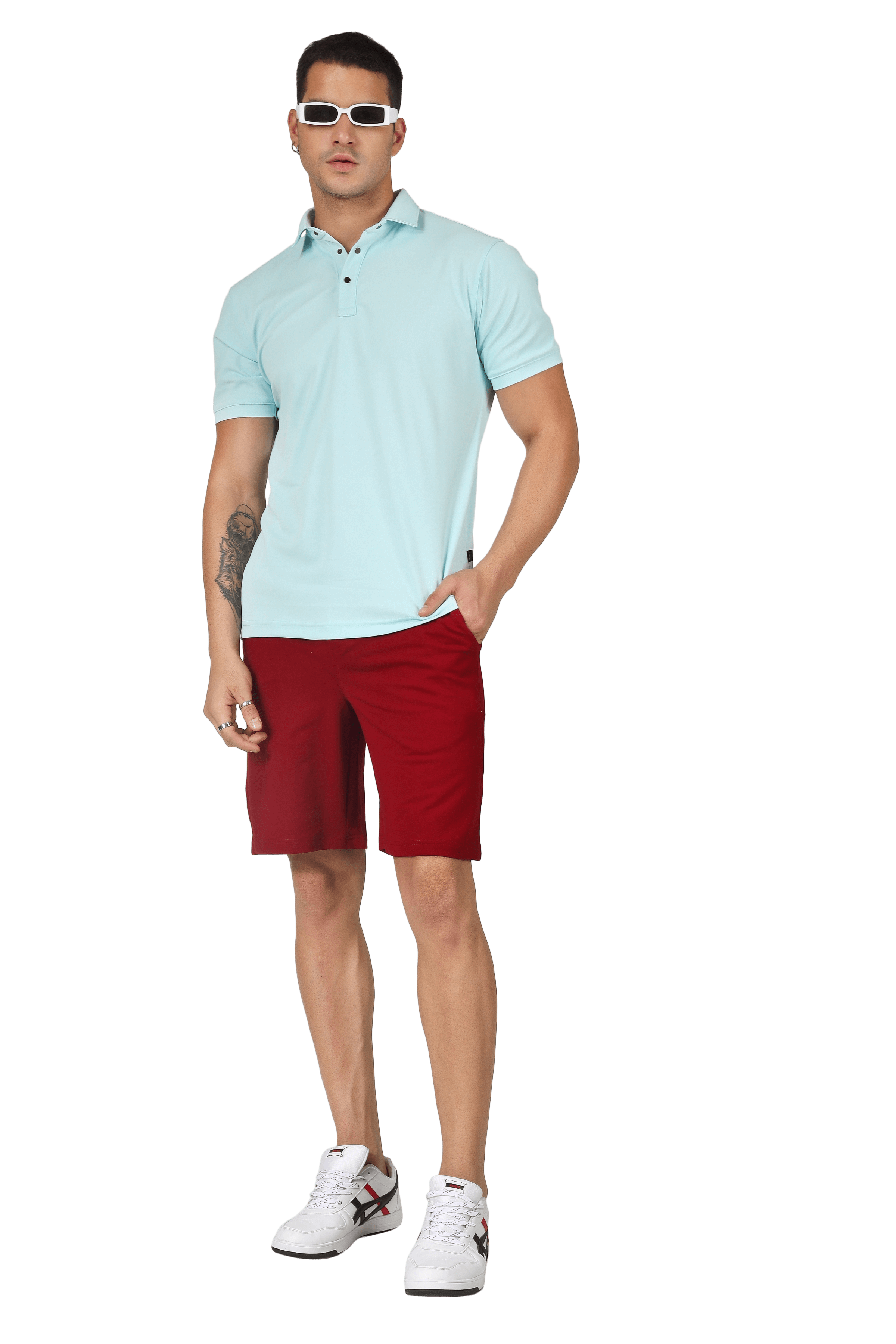 Model wearing vintage regular fit burgundy shorts with a light blue polo shirt and white sneakers.