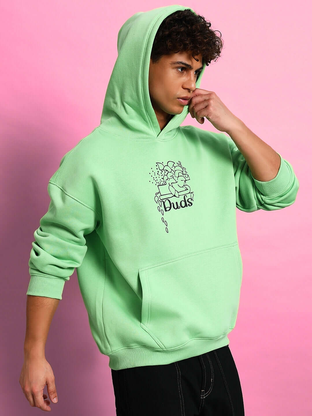 Model wearing VOODO OVERSIZED FLEECE HOODIE GREEN in a striking color perfect for stylish streetwear fashion.
