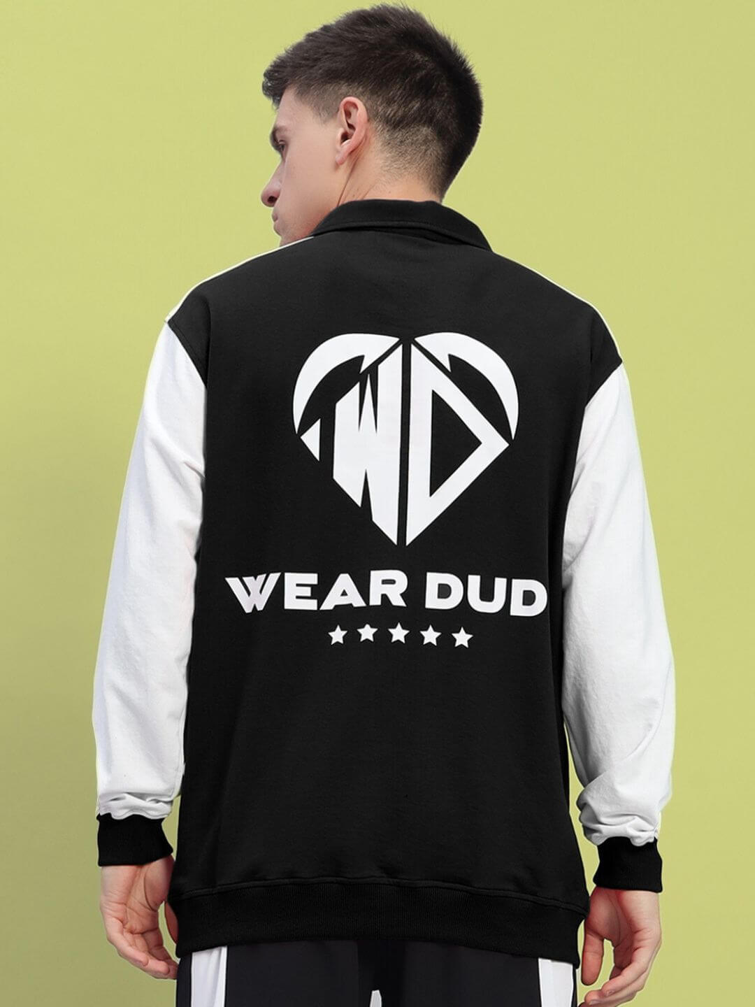 Back view of a WD Corvus Sweatshirt in white and black, featuring premium cotton French terry fabric, worn by a male model.