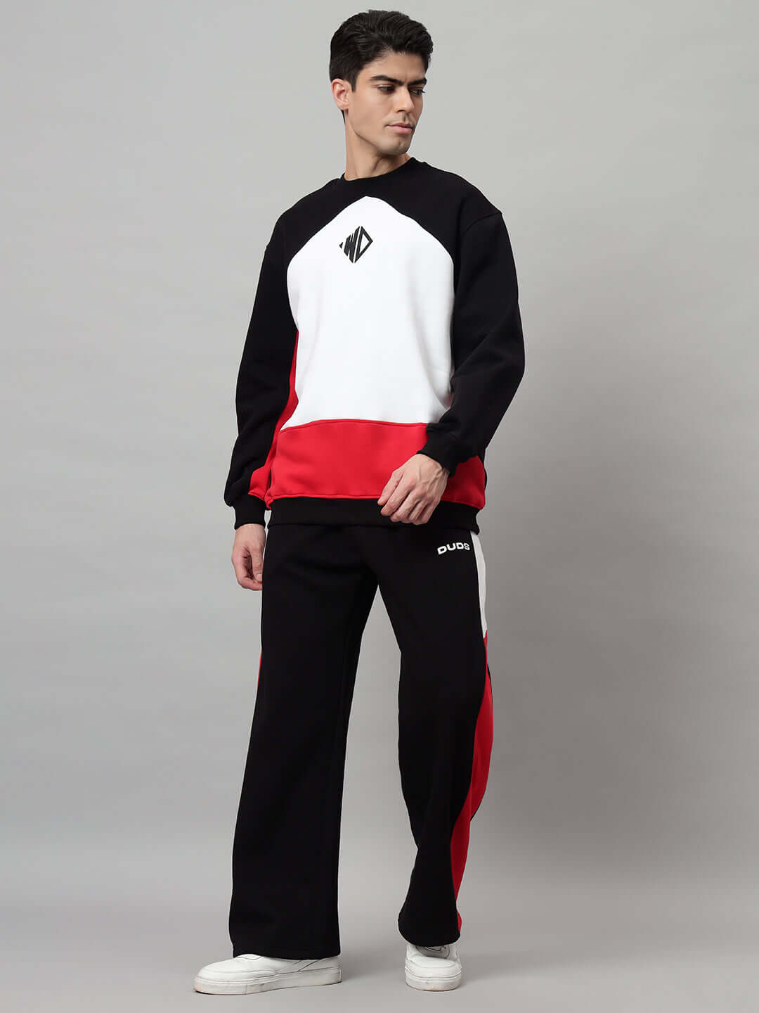 Model wearing WD Fervid Colorblock Co-Ord in black, white, and red, showcasing the outfit's modern style and design by DUDS.