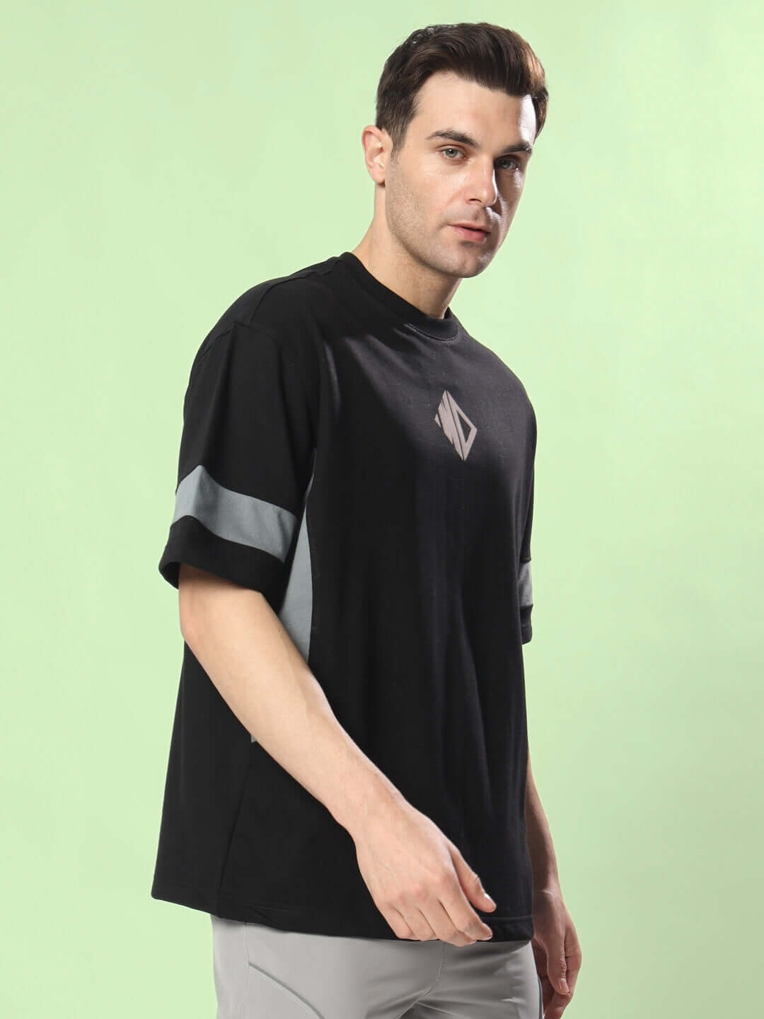 WD Gorpcore Oversized T-Shirt in Black-Grey, featuring premium fabric blend, worn by model, showcases stylish design and comfort.