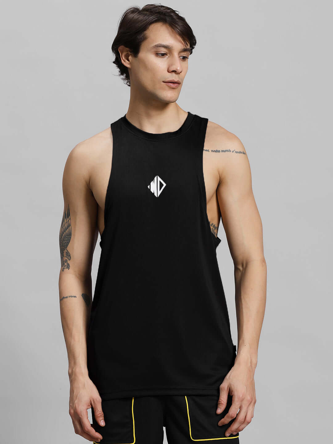Man wearing WD STRINGER GYM SLEEVELESS T-SHIRT BLACK