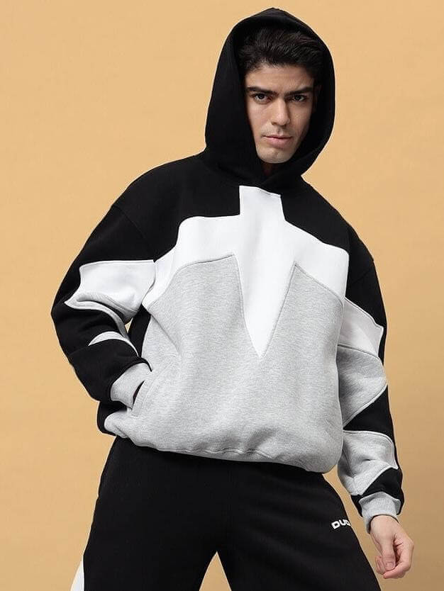 Model wearing WD Sword Colorblock Co-Ord in black-grey with hood, designed by experienced tailors at DUDS. Custom fit available.
