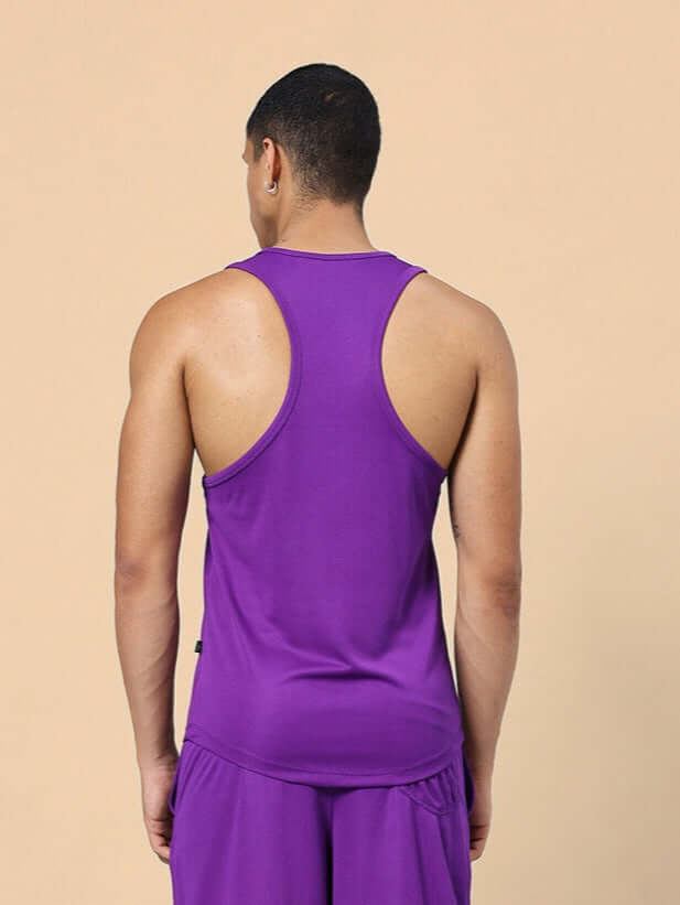 Back view of man wearing WD WINGS GYM T-SHIRT MEN PURPLE for workouts.