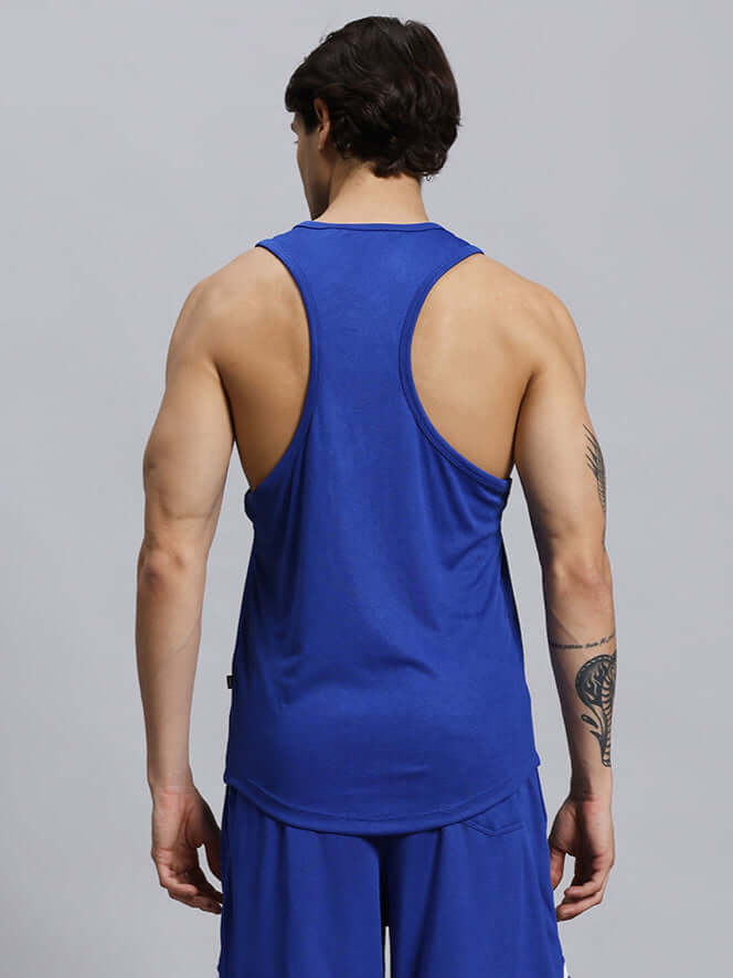 Back view of man wearing WD WINGS GYM T-SHIRT ROYAL BLUE showcasing breathable design and athletic fit for high performance workouts.