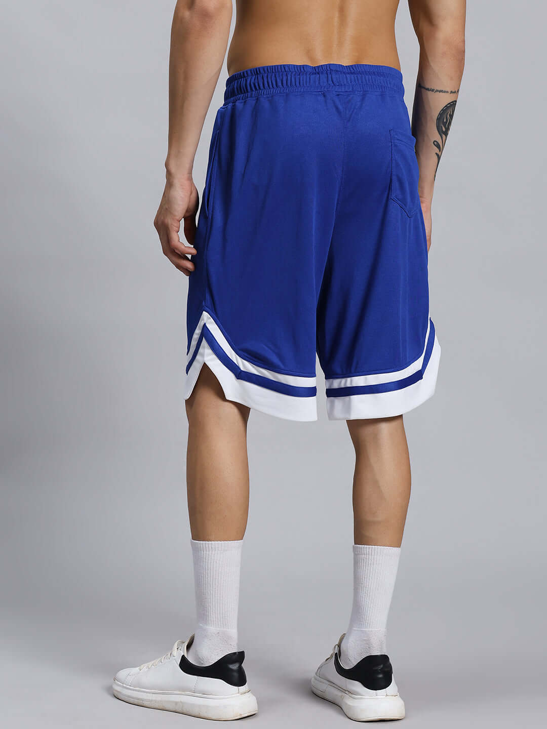 Back view of WD Wings Regular Fit Shorts Royal Blue worn by model, highlighting style and comfort.