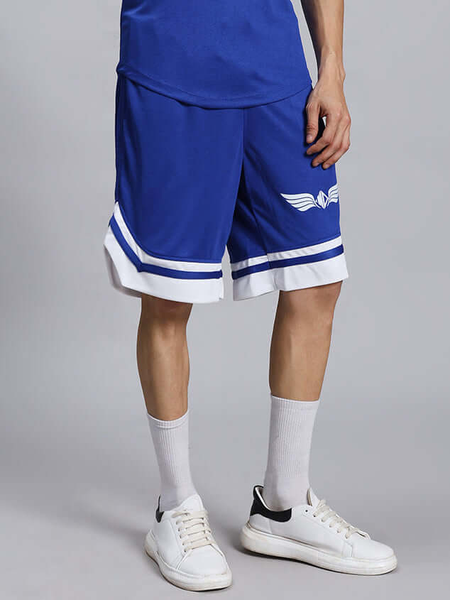 Model wearing WD WINGS REGULAR FIT SHORTS ROYAL BLUE, showcasing breathable and comfortable activewear shorts for workouts and casual wear.