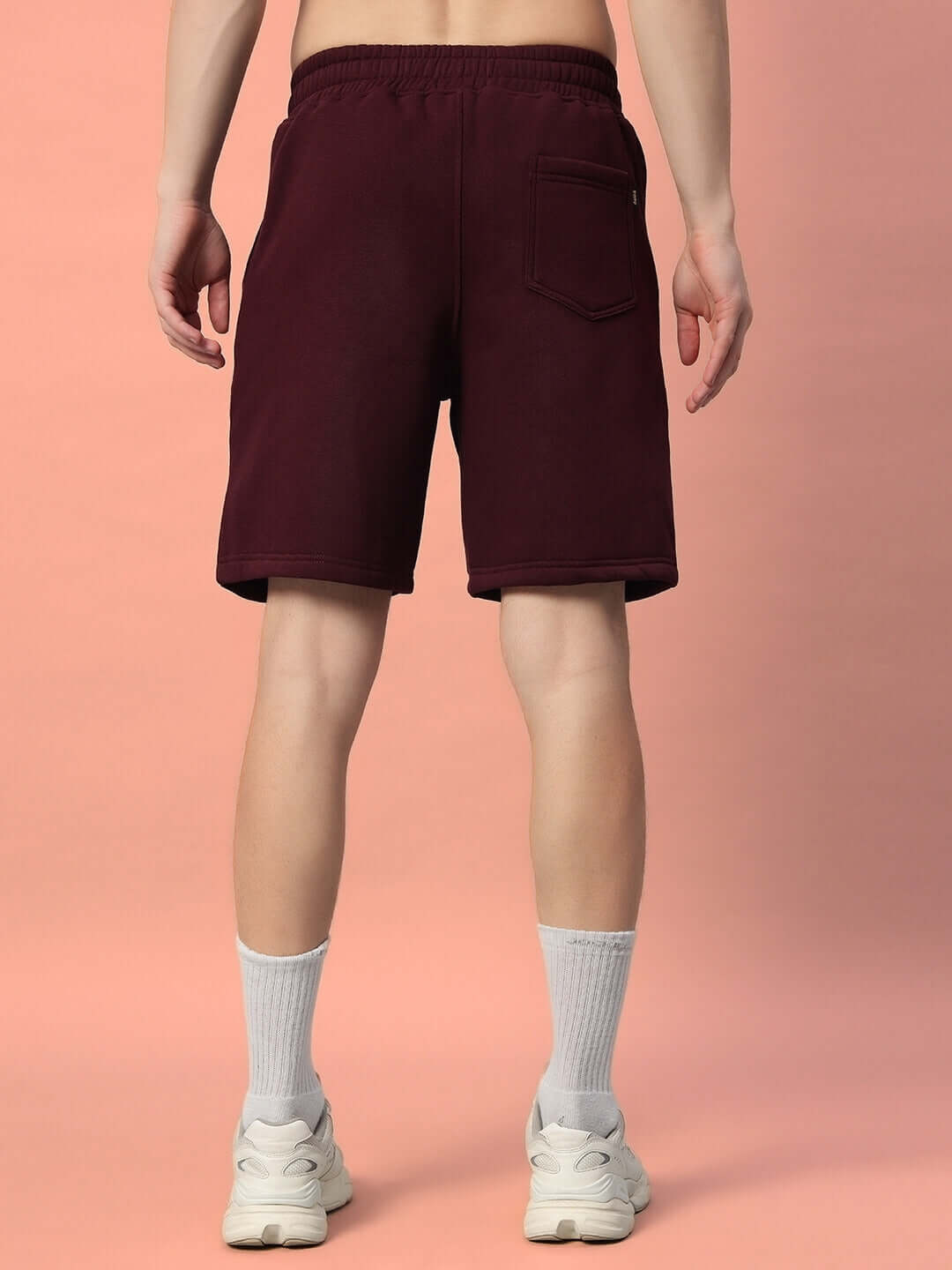 Back view of WEARDUDS JUMBLED FLEECE SHORTS WINE showcasing relaxed streetwear style and comfort.