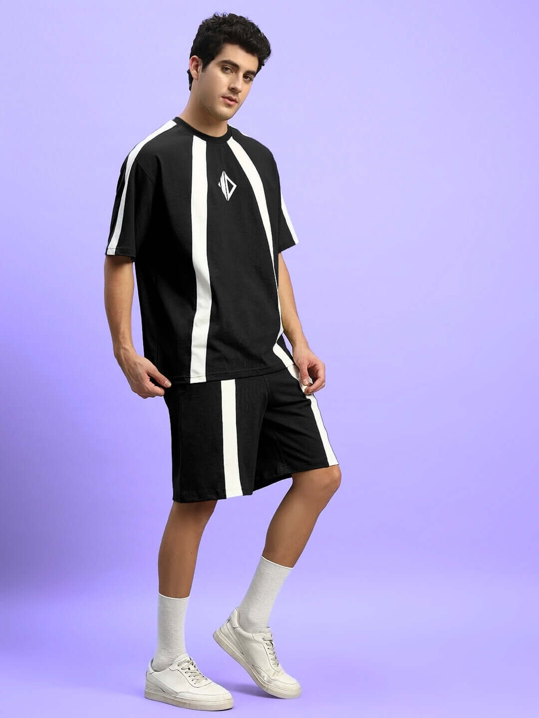 Model wearing Wideline Summer Co-ord Set in black, featuring a stylish design in premium cotton terry fabric, ideal for a trendy summer look.