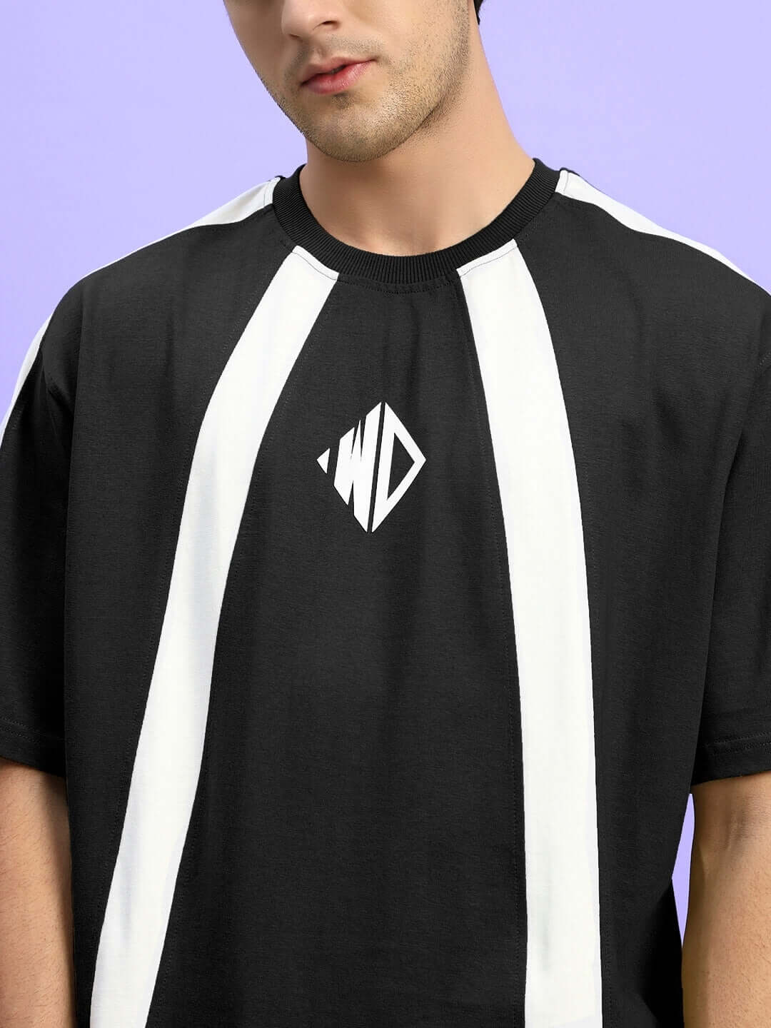 Person wearing WIDELINE Summer Co-ord Set in black with white accents, made of premium cotton blend. Ideal for stylish comfort.
