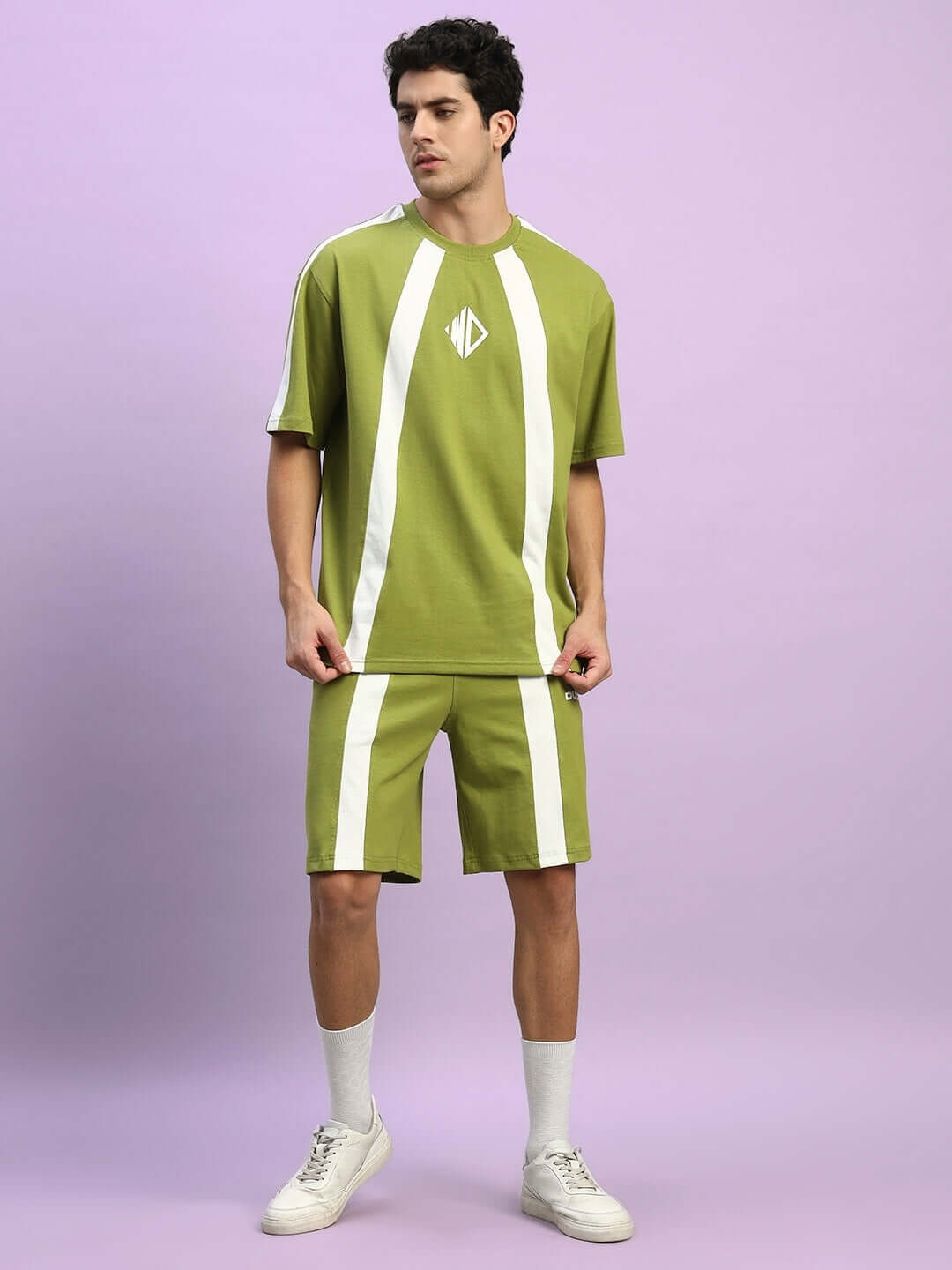 Model wearing WIDELINE SUMMER CO-ORD SET OLIVE GREEN, featuring premium cotton fabric and stylish design.