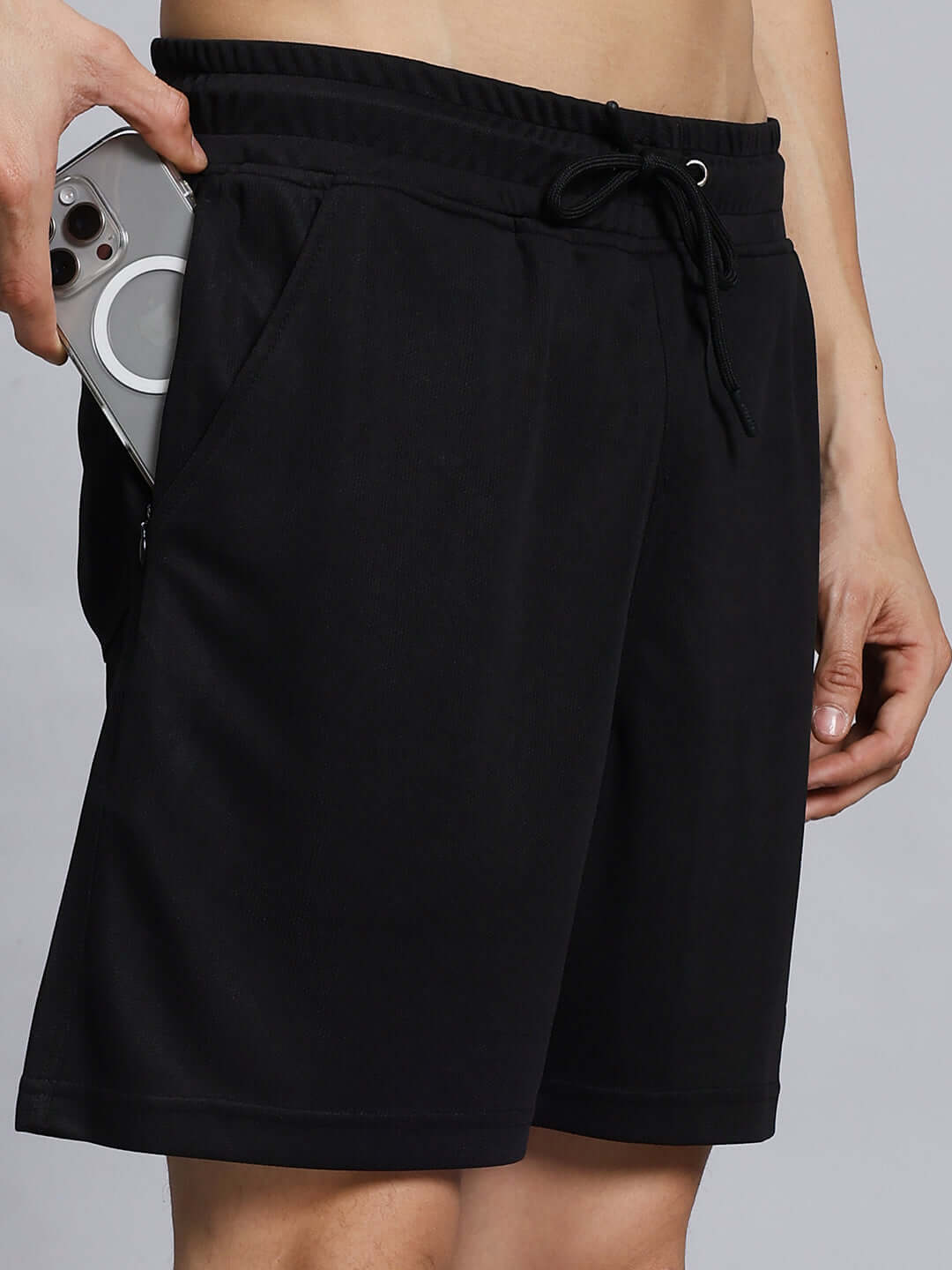 WILY TACTICAL REGULAR FIT SHORTS MEN BLACK showcasing flexibility and style with side pockets for convenience.