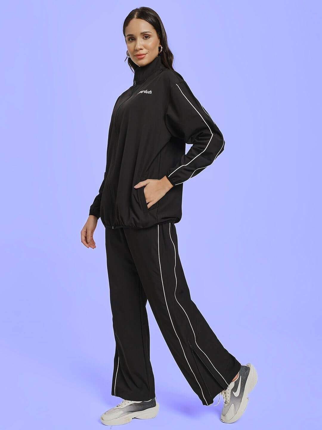Model wearing WOMEN RELIGHT RELAXED FIT CO-ORD SET BLACK, showcasing stylish loungewear with ease and elegance.