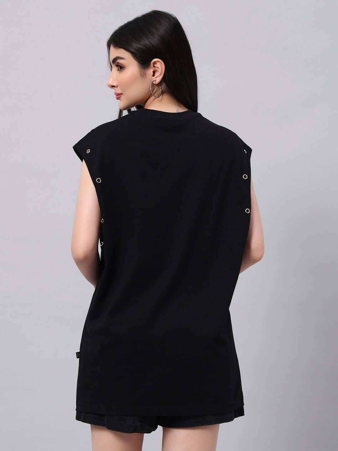 Back view of model wearing WOMENS ALVEN OVERSIZED T-SHIRT BLACK, showcasing stylish oversized fit and high-quality cotton blend fabric.