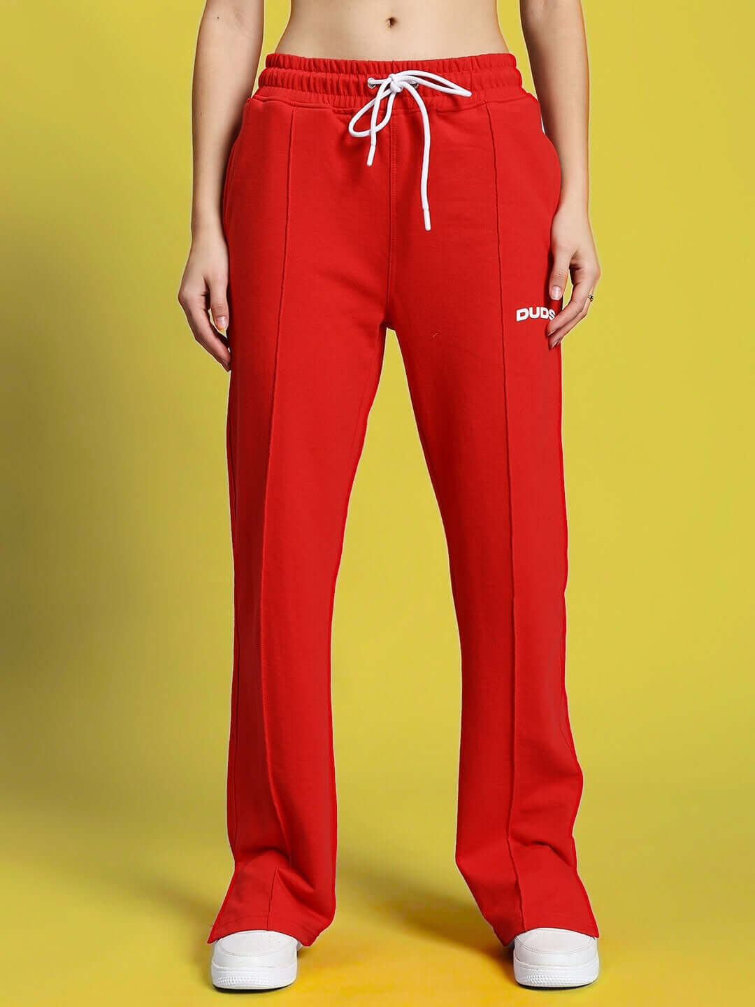 Red women's joggers with elasticated waistband and drawstring, part of the ANISSA CO-ORD set, relaxed fit and made from premium cotton.