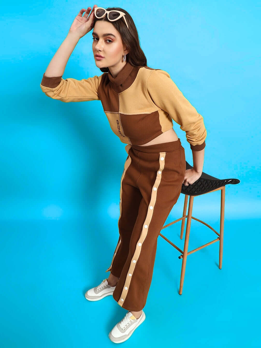 Women's Aurora Co-Ord Set in beige-brown with a stylish design, made from premium cotton French terry fabric, shown on a model against a blue background.