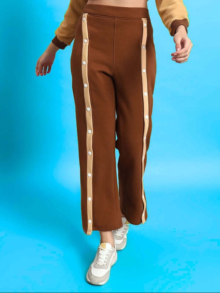 Women's Aurora beige-brown fleece pants with front buttons, stylish and comfortable, perfect for casual wear.