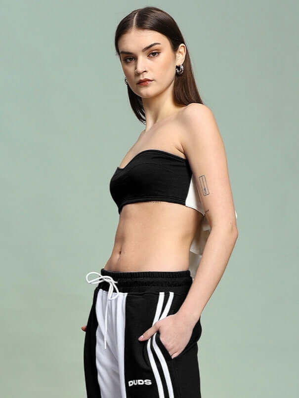 Model wearing Women's Azora Bandeau Top in black, made of premium heavy gauge 100% cotton fabric. Casual and stylish design.