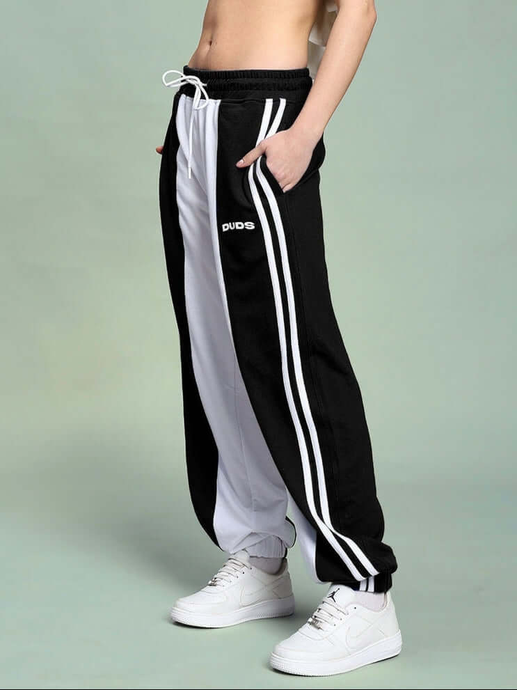 Women's Balmy Relaxed Fit Jogger in white and black, featuring a custom fit option and made-to-order by DUDS' skilled tailors.