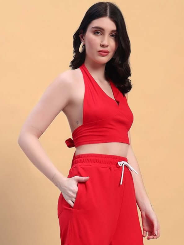 Model wearing Women's Belove Crop-Top in red, made from premium heavy gauge fabric featuring 97% cotton and 3% elastane. Ideal for casual wear.