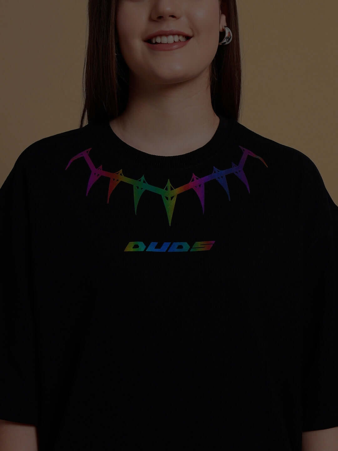 Over-sized black T-shirt featuring colorful Black Panther graphic and 'DUDE' text, made from premium cotton fabric.