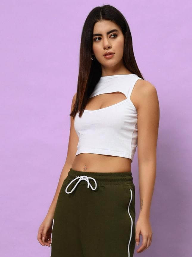 Model wearing WOMEN BLINK COTTON CROP-TOP WHITE against purple background.