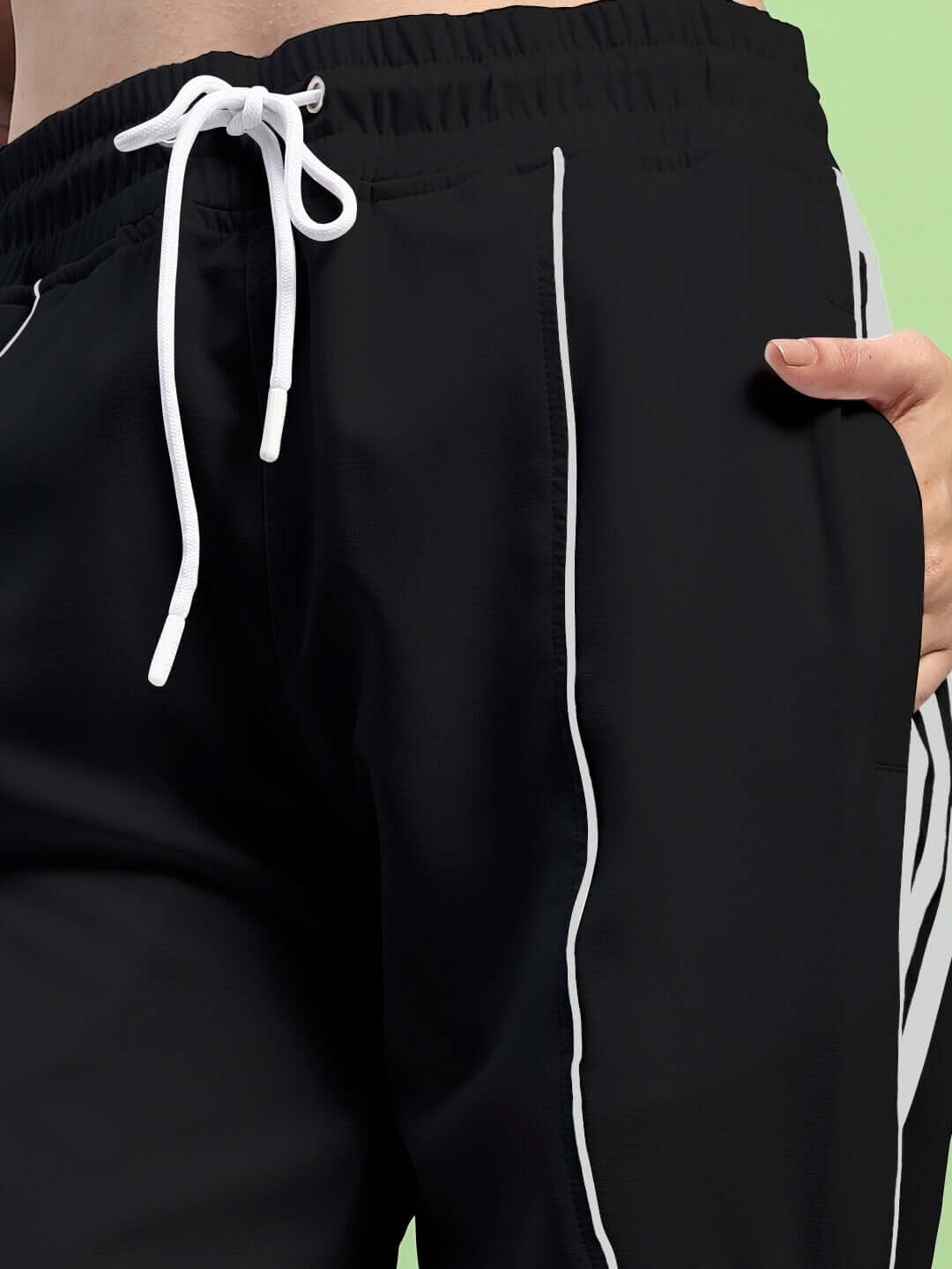 Close-up of Womens Bolson Stripes Relaxed-Fit Joggers Black, featuring white drawstrings and stripe detailing, ideal streetwear.