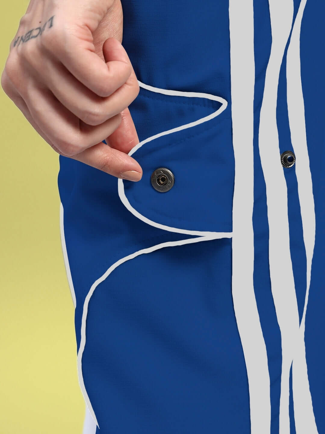 Close-up of WOMENS BOLSON STRIPES RELAXED-FIT JOGGERS BLUE showcasing button detail.