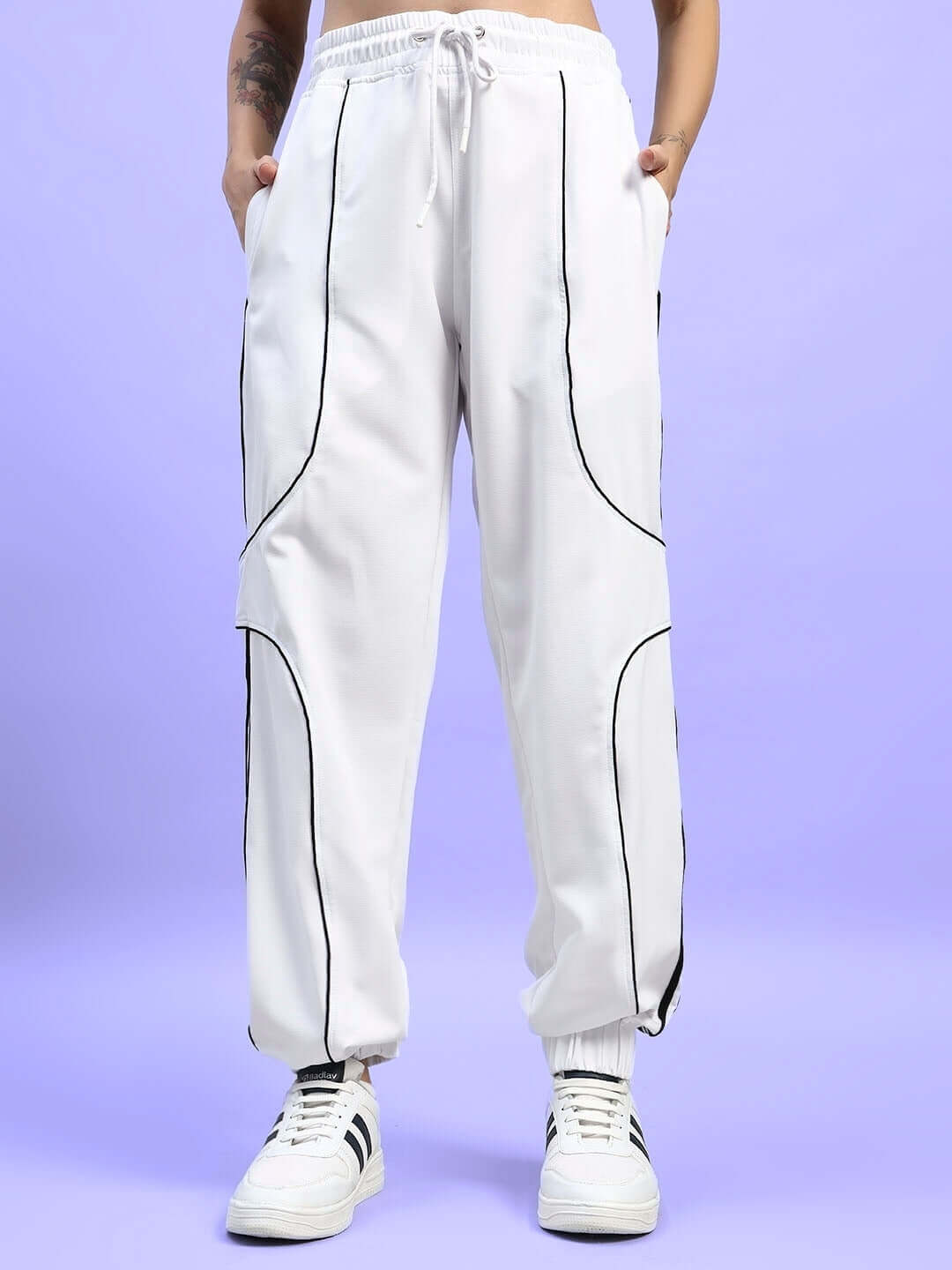 WOMEN'S BOLSON STRIPES RELAXED-FIT JOGGERS WHITE displayed on a model against a purple background
