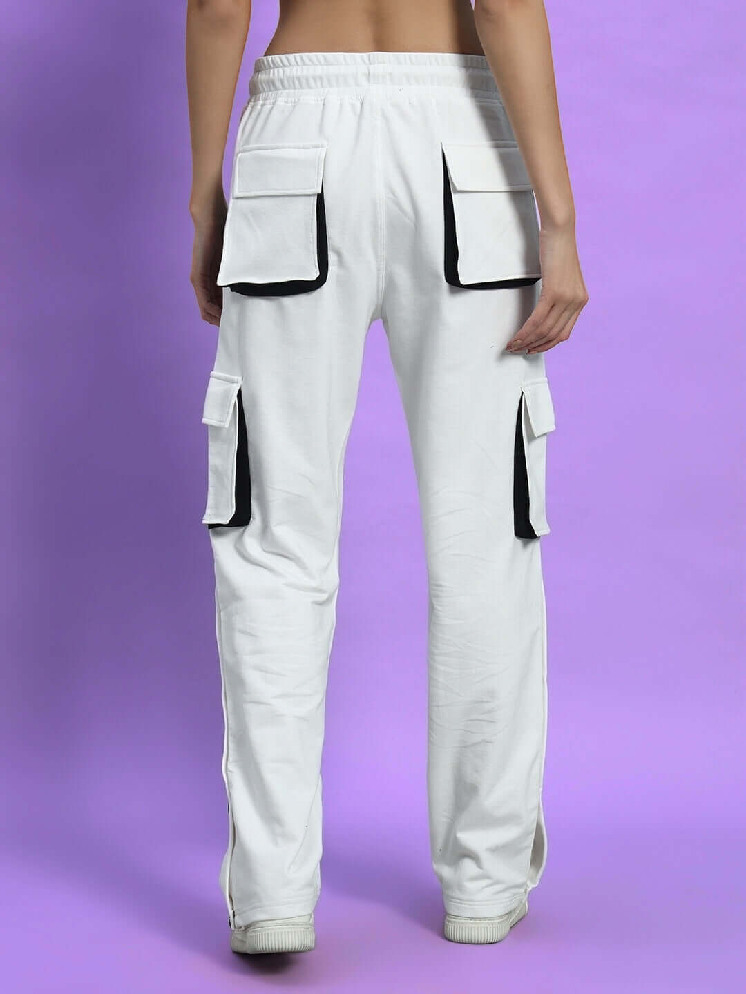 Back view of WOMEN'S BRACKET CARGO PANT WHITE BLACK HIGHLIGHTER with black pocket accents.