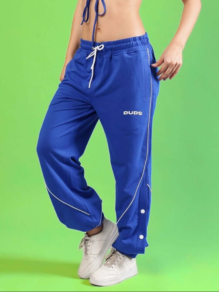 Women's royal blue joggers by DUDS, featuring a contrast design and drawstring waist, ideal for comfortable and stylish wear.