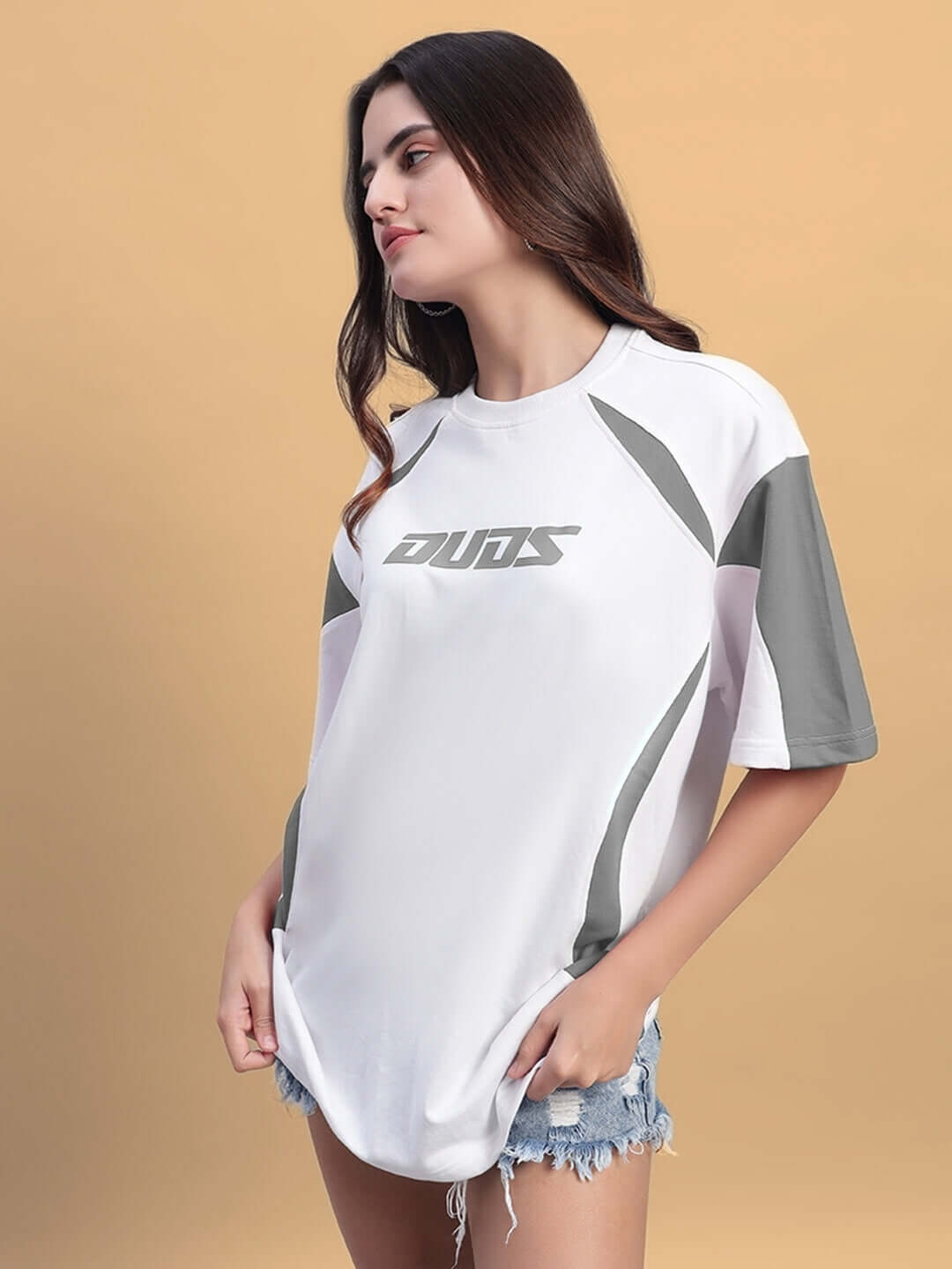 Woman wearing oversized white-grey T-shirt, premium cotton French terry fabric, designed by Color By Colours.