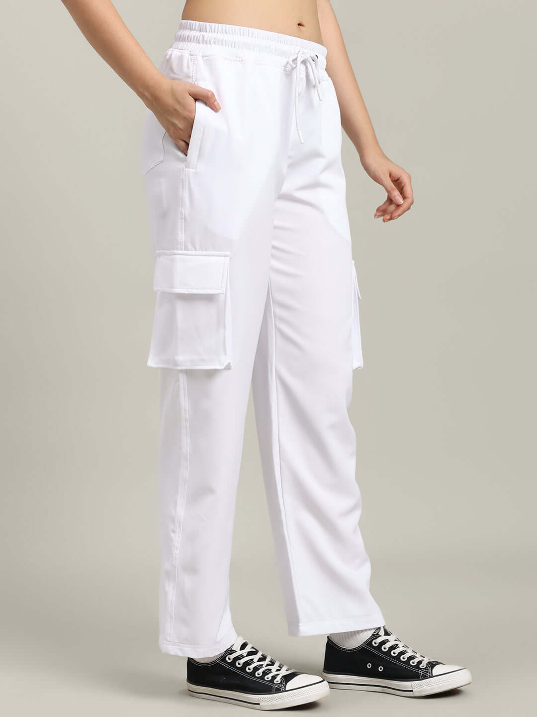 WOMEN'S CARMINE RELAXED FIT JOGGER WHITE - side view with pockets, worn with black sneakers