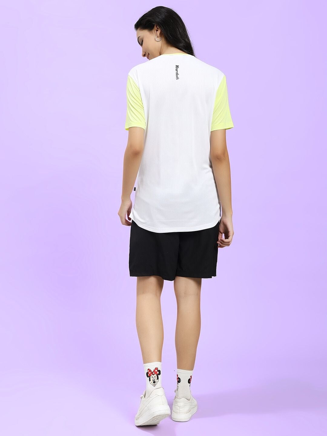 Back view of WOMEN CHAMPION ZONE REGULAR FIT CO-ORD WHITE NEON BLACK showing sporty design and casual elegance.