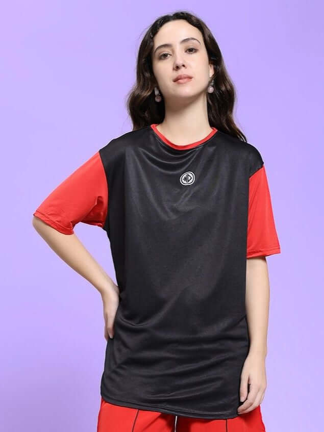 Woman wearing WOMEN CHAMPION ZONE REGULAR FIT T-SHIRT BLACK RED against a purple background.