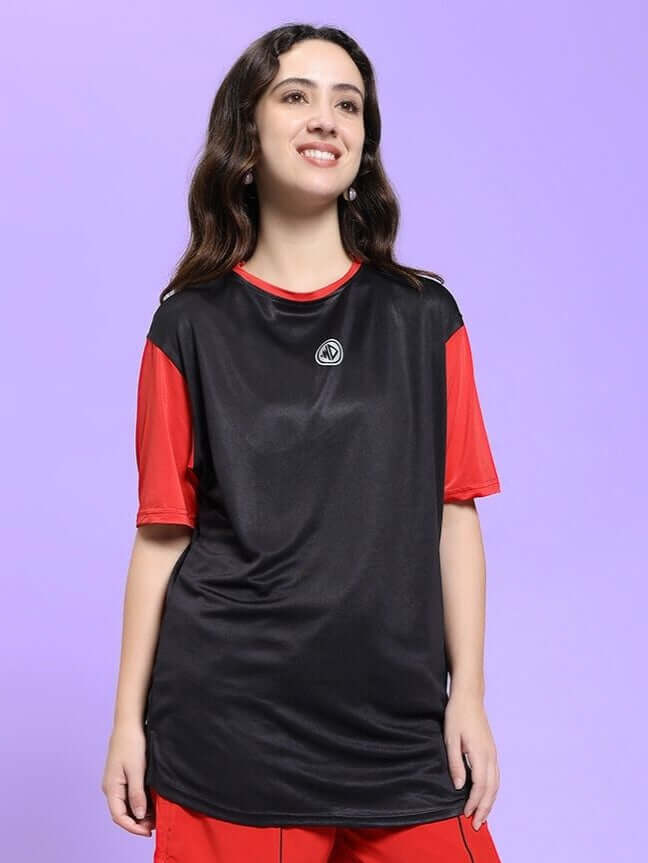Woman wearing WOMEN CHAMPION ZONE REGULAR FIT T-SHIRT BLACK RED against purple background