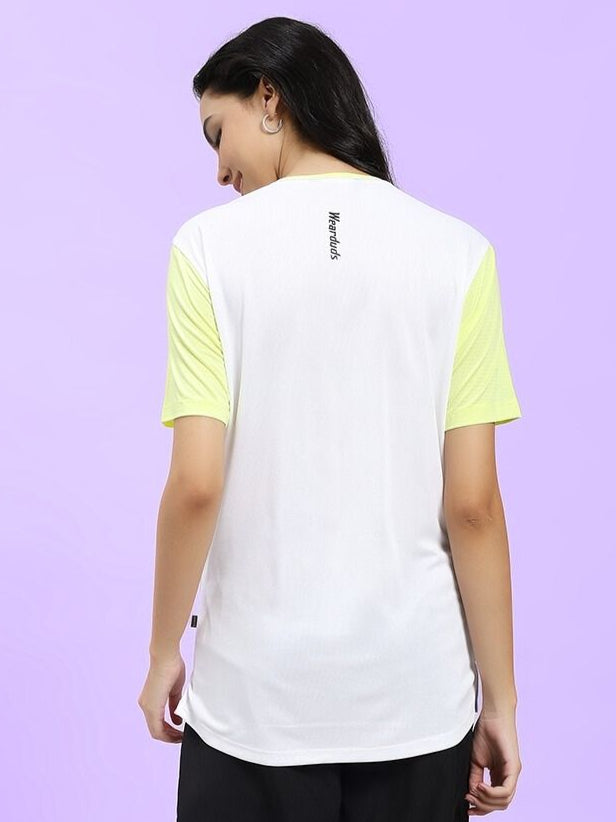 Back view of WOMEN CHAMPION ZONE REGULAR FIT T-SHIRT WHITE NEON-GREEN worn by a model, featuring neon-green sleeves and Champion logo.