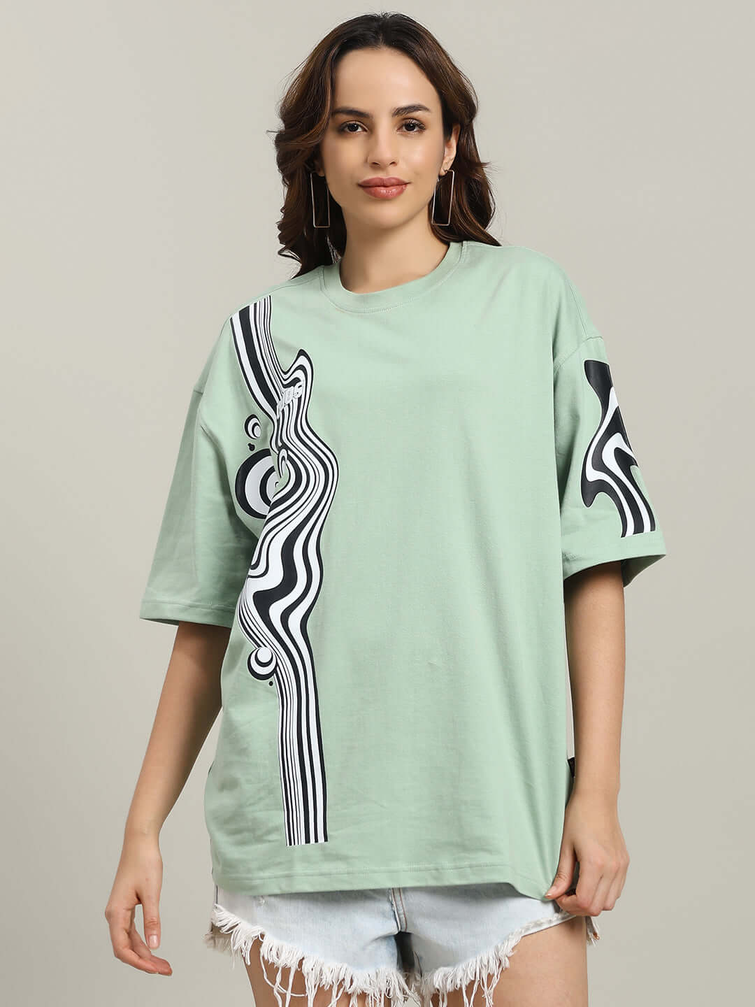 Women's Chimera oversized T-shirt in Nyanza Green, featuring abstract black and white design, crafted from premium cotton blend fabric.