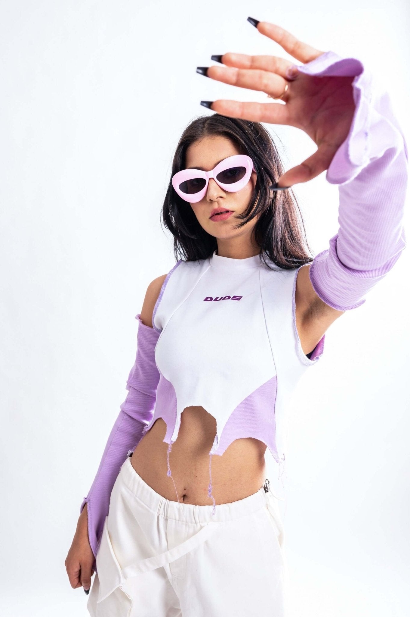 WOMENS COLOR BLOCK CROP TOP WITH LONG SLEEVE showcasing modern fashion with bold style and sporty edge.