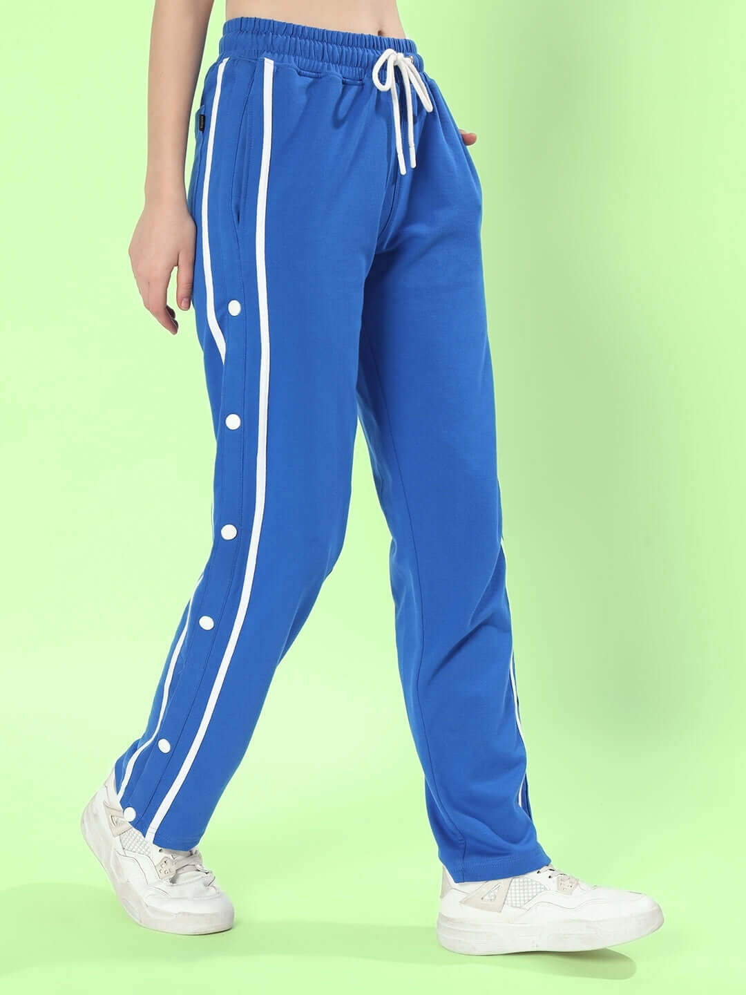 Women's blue contrast panel joggers with white stripes from DUDS, showcasing a custom fit style, ideal for casual wear.