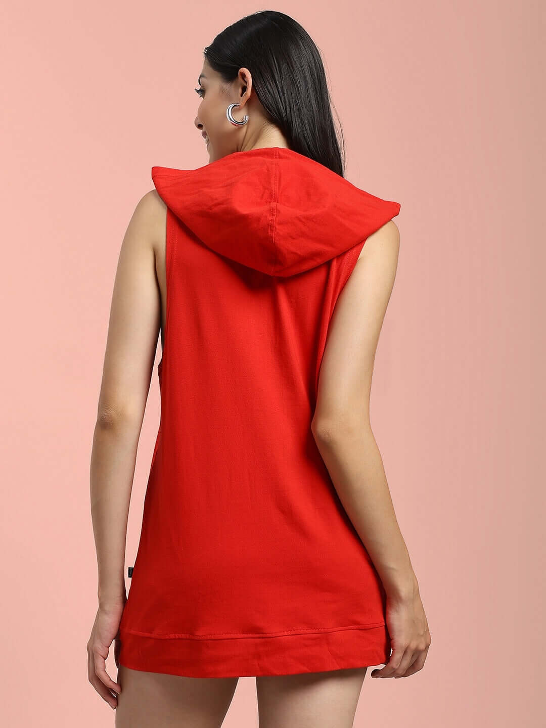 Back view of a woman wearing a red Cybran Gym hooded t-shirt, sleeveless design, perfect for workouts and casual wear.