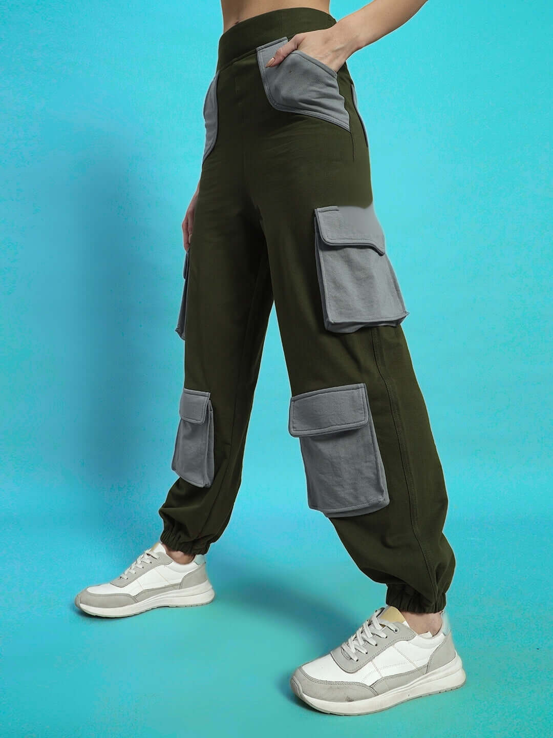 Model wearing Women's Daniel Co-ord Set Olive Grey with cargo pants and sneakers