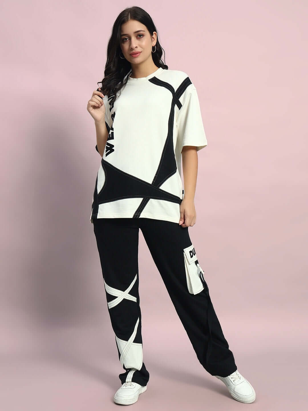 Women's David oversized co-ord set in off white and black, featuring relaxed fit joggers with an elasticated waistband and drawstring.