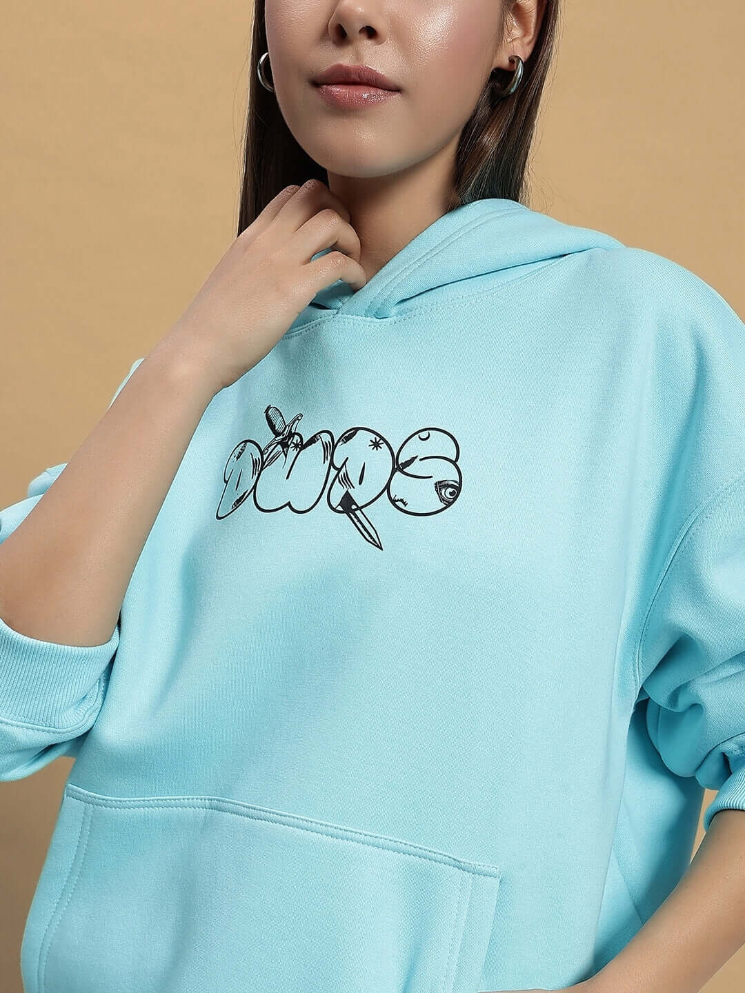 Stylish WOMEN DEMON FLEECE CO-ORD SKY BLUE hoodie from DUDS, modeled by a woman, featuring the text 'Dude' on the front.